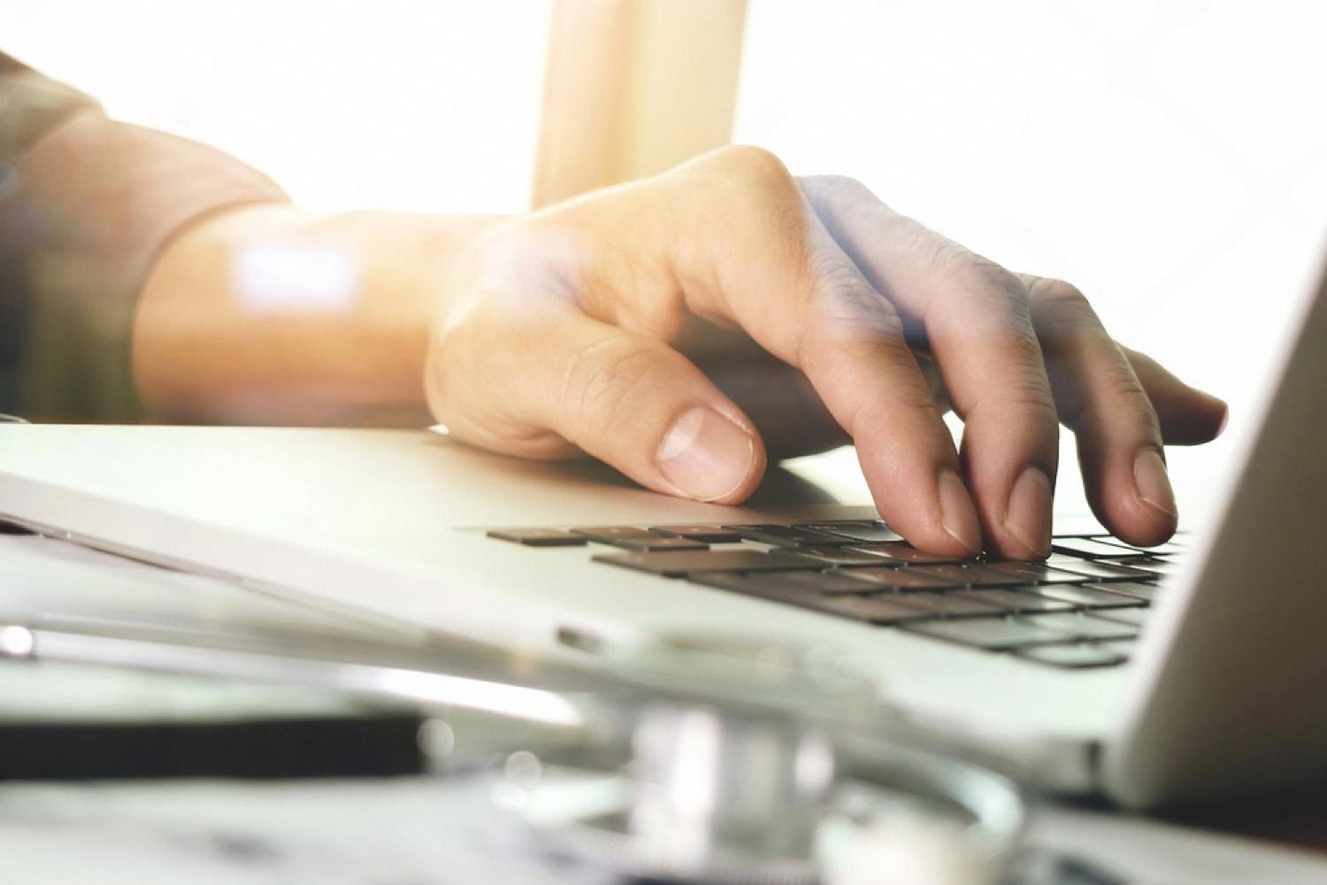 Person booking a service appointment on a laptop for a UAE government centre